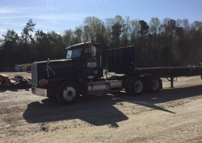 Apex Steel Corp's Tractor-Trailer for structural steel deliver in central and eastern NC